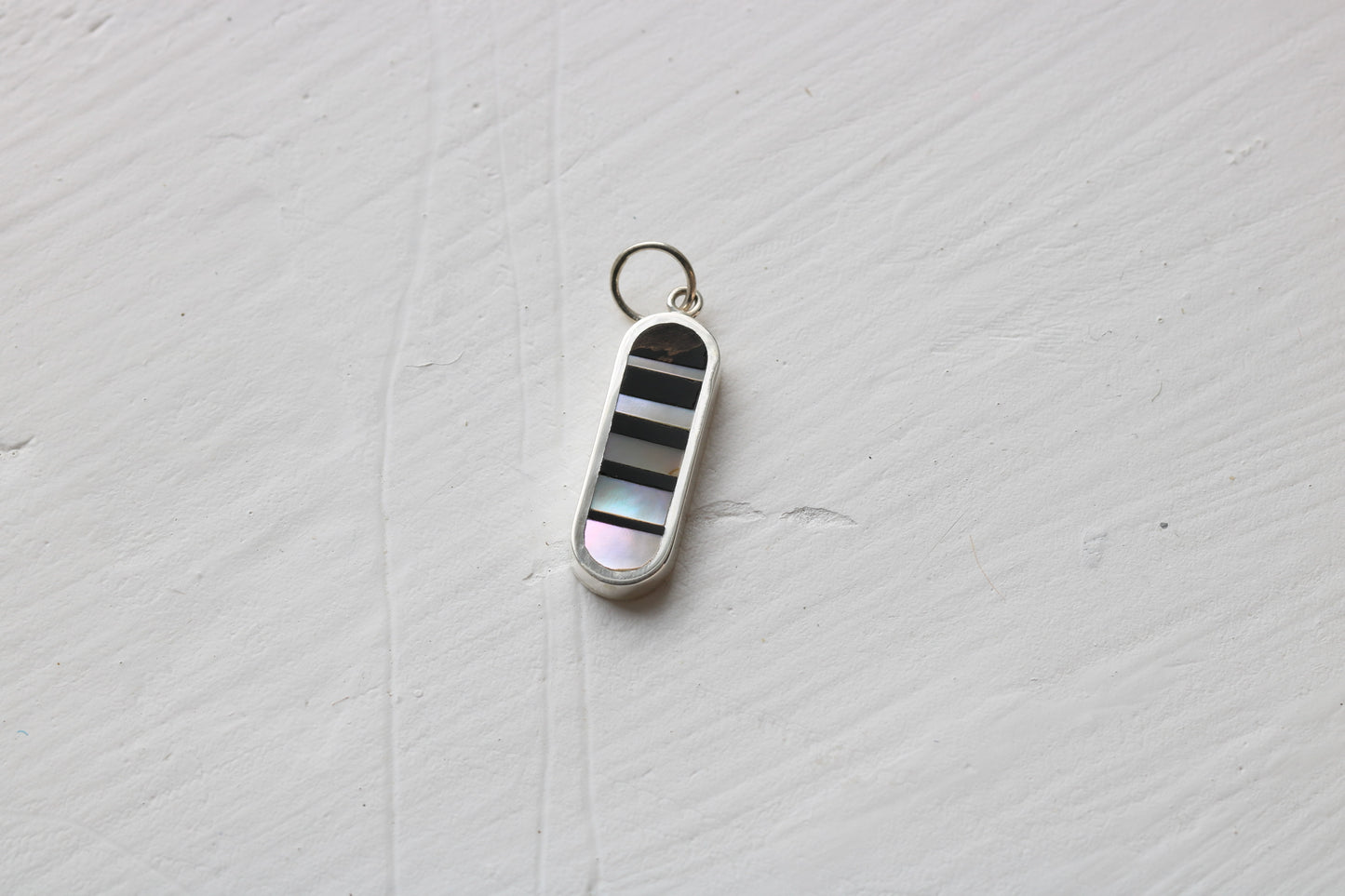 Infinity Charm vertical silver MTO