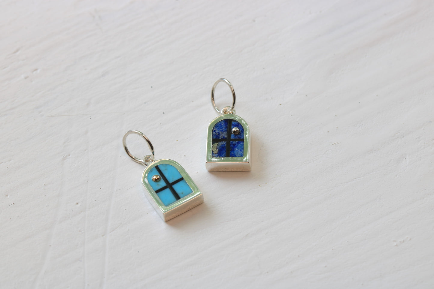 window charms in sterling silver with Kingman turquoise and lapis lazuli inlay with 14k gold sun or sterling silver moon on white background