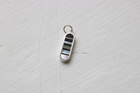 Infinity Charm vertical silver MTO