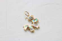 Load image into Gallery viewer, 14k gold caterpillar in five pieces of inlaid abalone on white background
