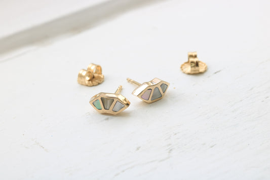 14k yellow gold fan studs with California red abalone inlay on white background
