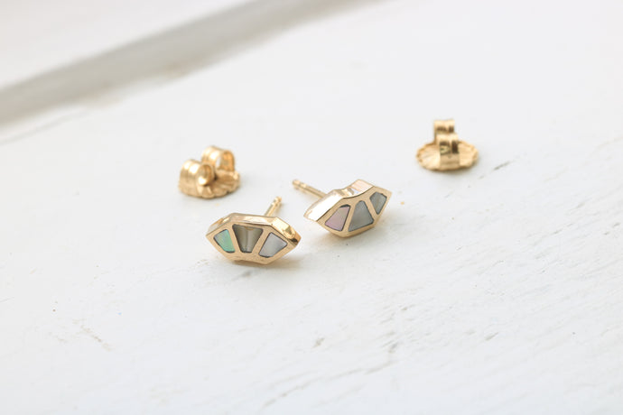 14k yellow gold fan studs with California red abalone inlay on white background