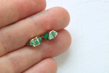 Load image into Gallery viewer, 14k yellow gold fan studs with  variscite inlay in hand on white background
