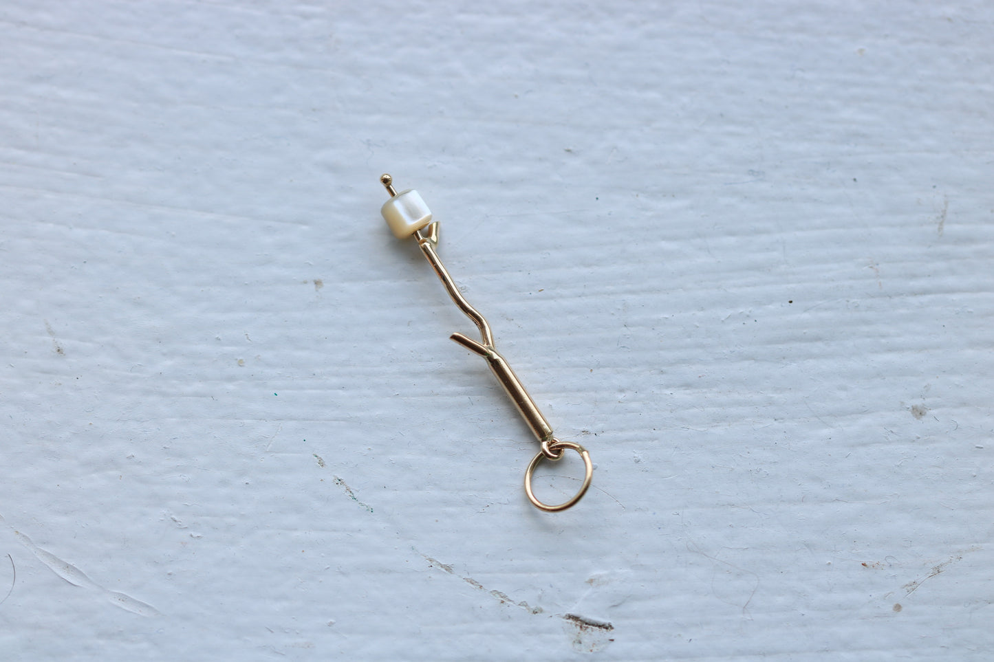14k yellow gold marshmallow charm with mother of pearl marshmallow bead