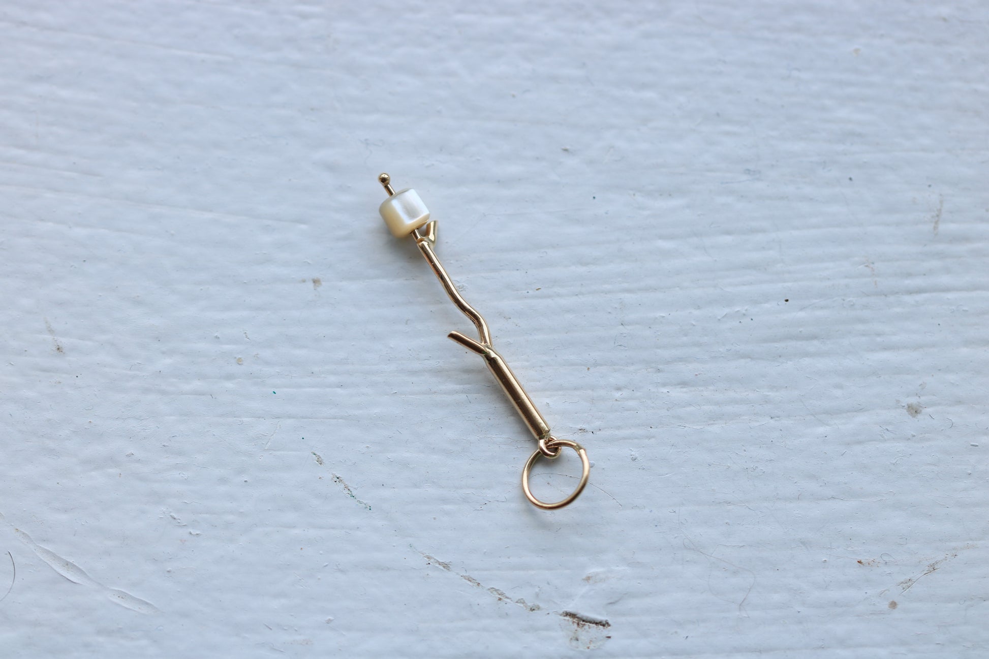 14k yellow gold marshmallow charm with mother of pearl marshmallow bead