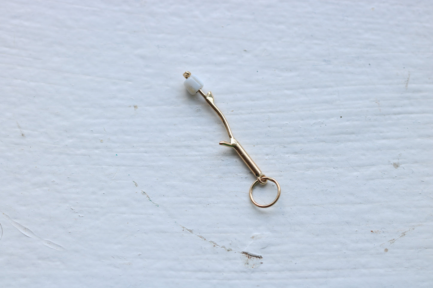 14k yellow gold branch with mother of pearl marshmallow bead