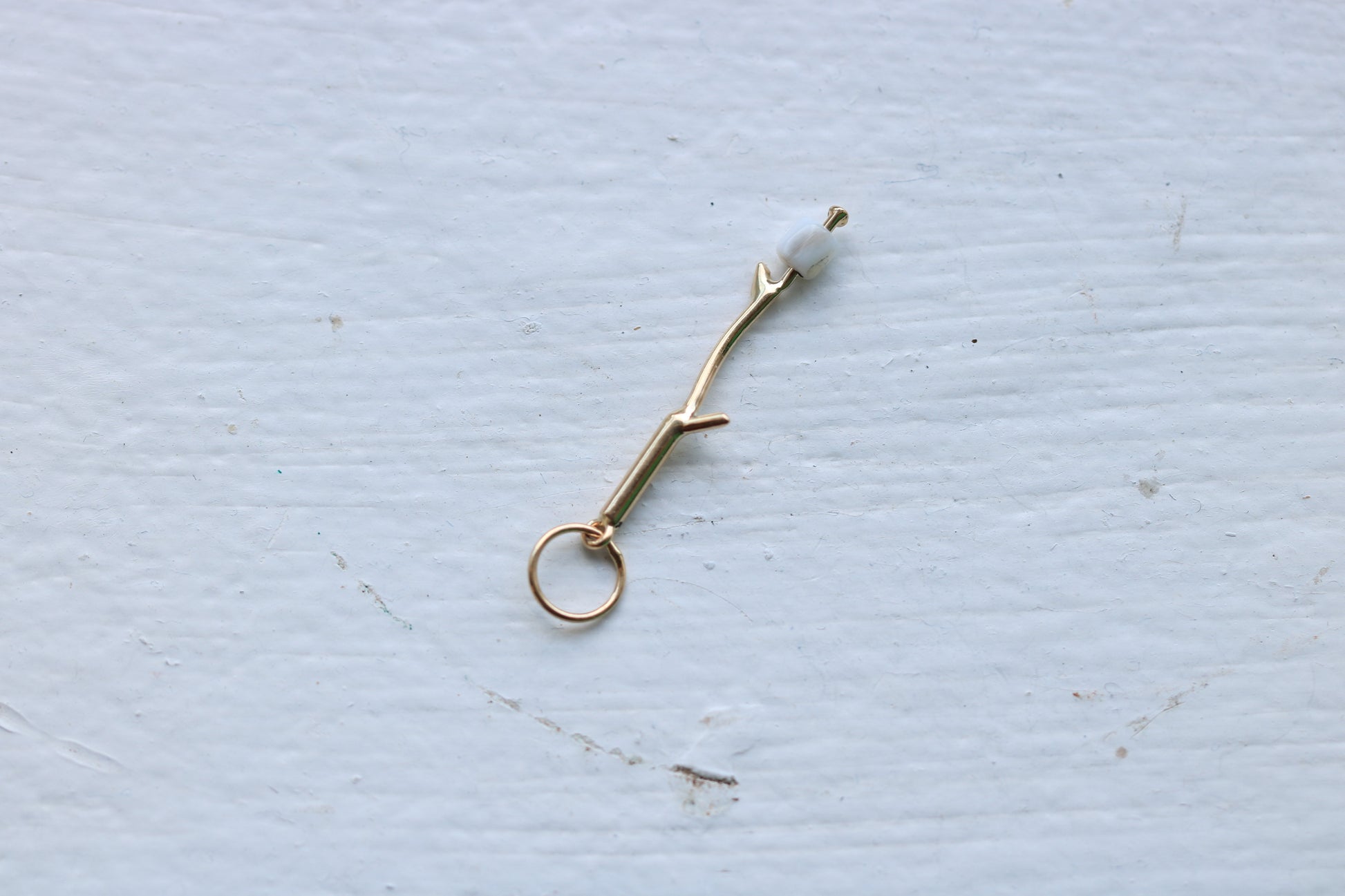 14k yellow gold branch with mother of pearl marshmallow bead