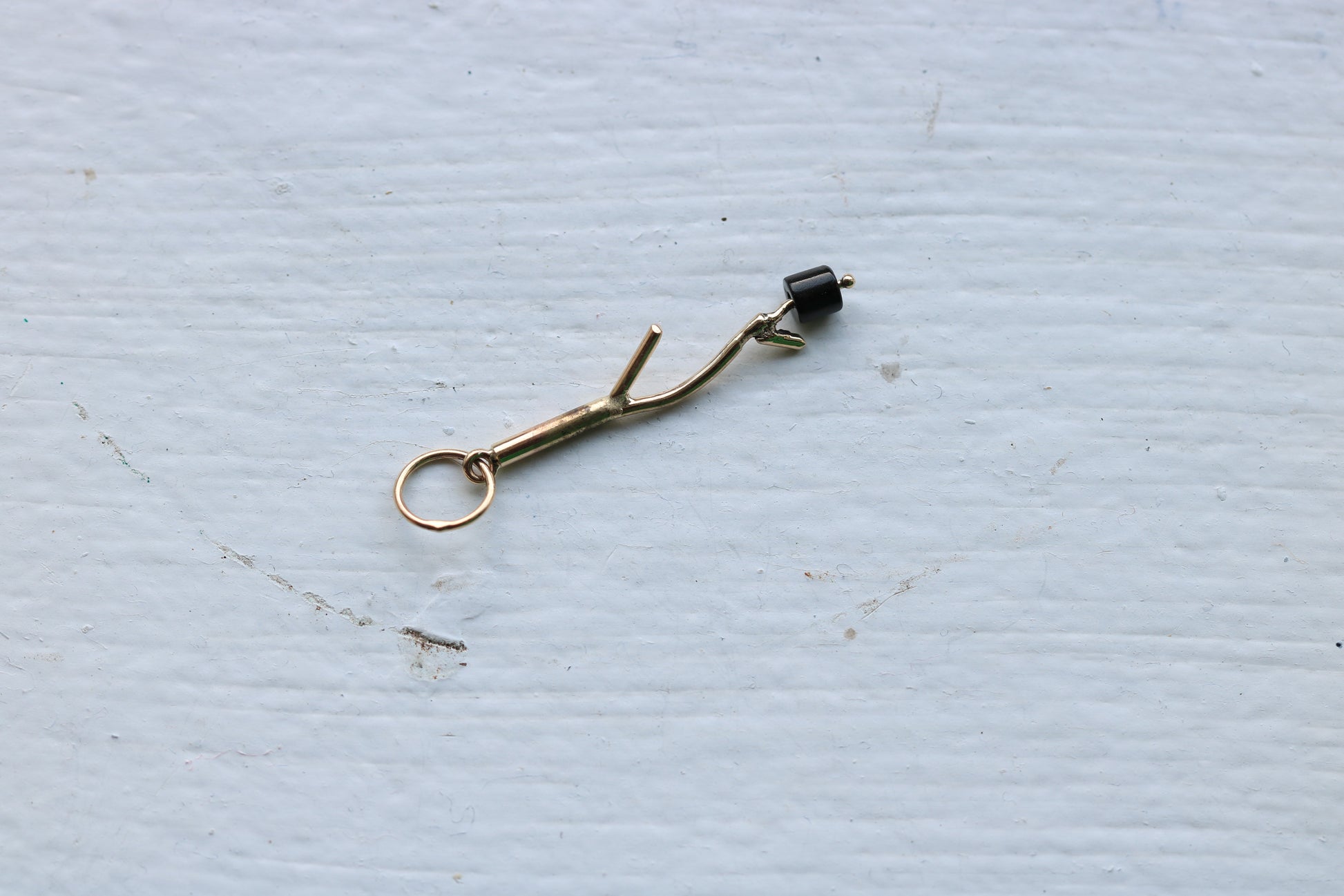 14k yellow gold branch onyx marshmallow bead.