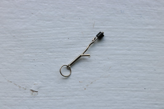 14k white gold branch with one  onyx marshmallow bead.