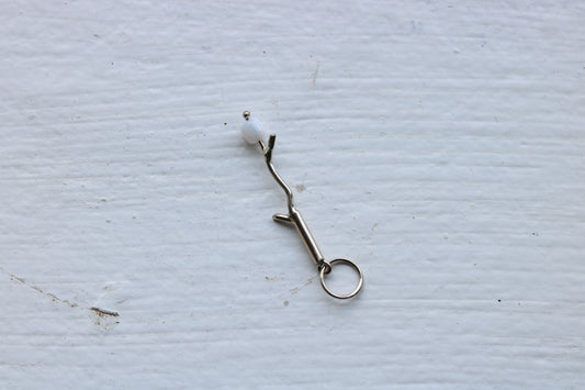 14k white gold branch with mother of pearl marshmallow bead.