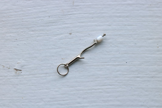 14k white gold branch with mother of pearl marshmallow bead.