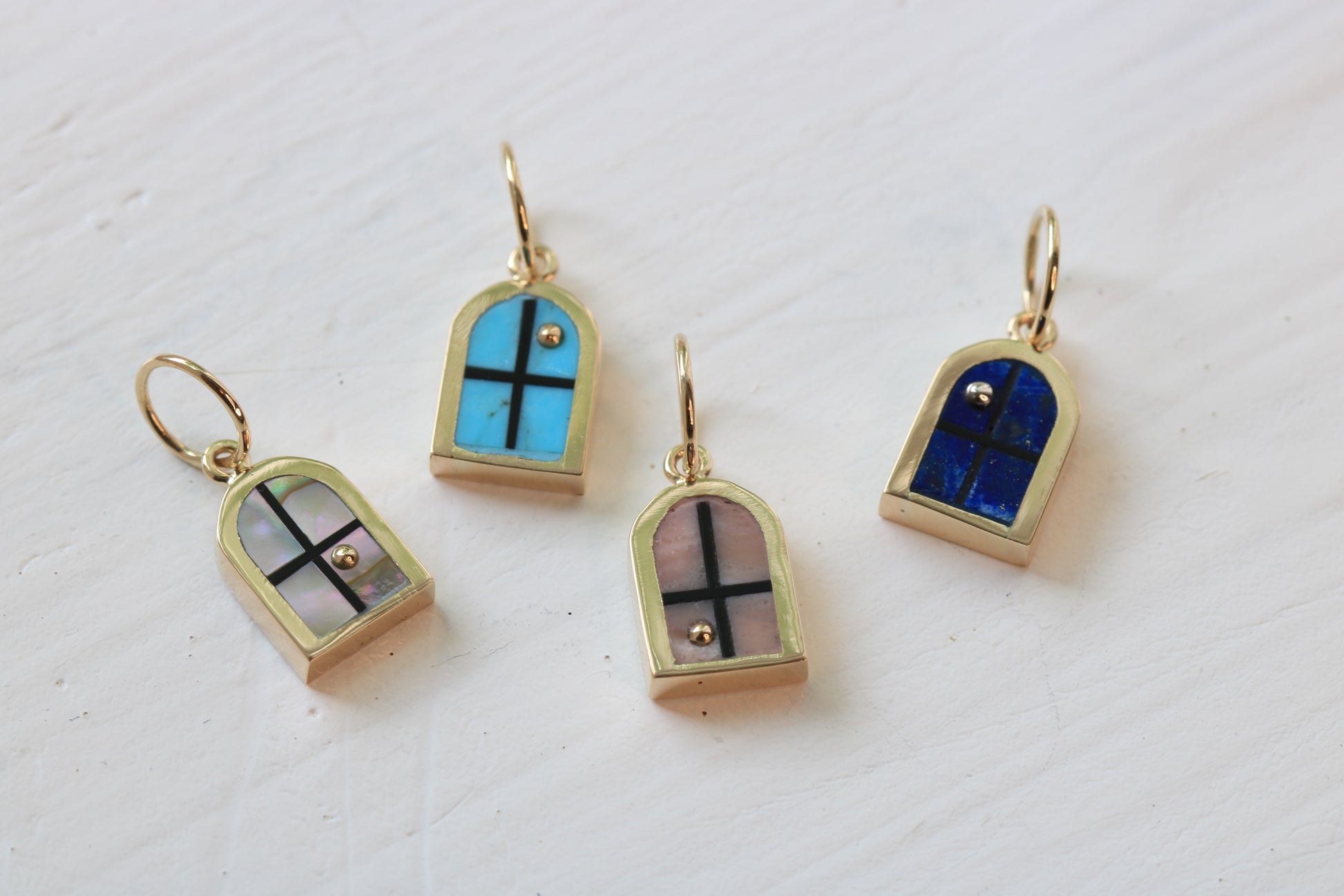 window charm series in 14k gold with abalone, turquoise, Peruvian pink opal, or lapis lazuli on white background