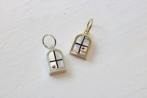 window charms in sterling silver or 14k yellow gold with California red abalone inlay and a 14k yellow gold sun