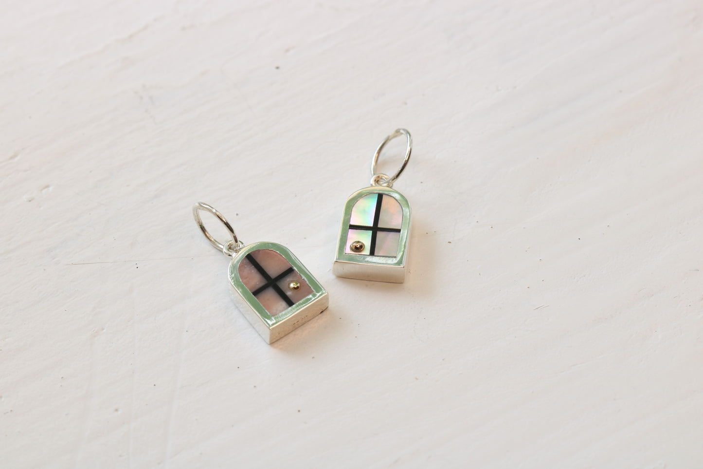 window charms in silver with pink opal and abalone inlay with 14k gold sun