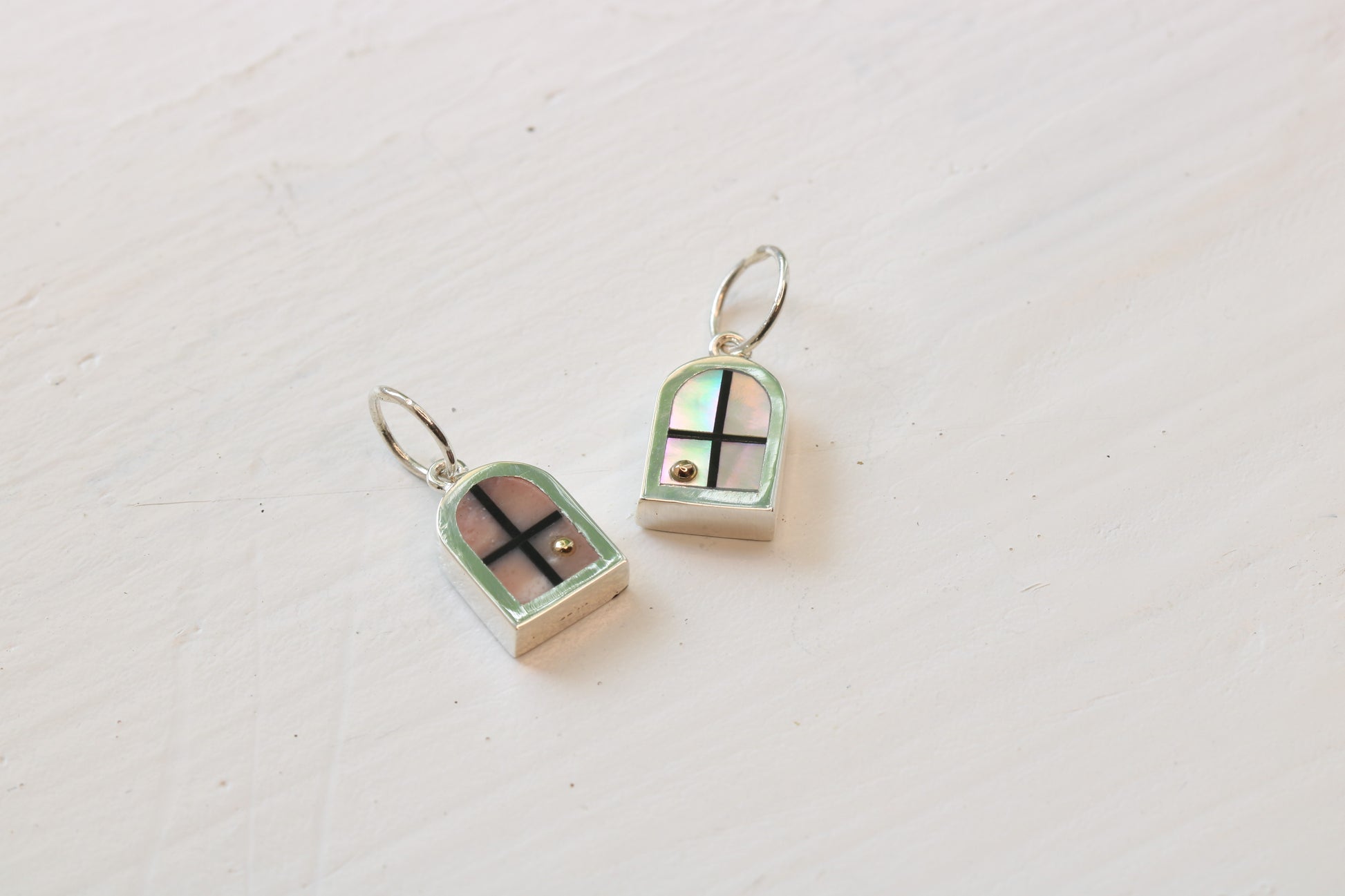 window charms in silver with pink opal and abalone inlay with 14k gold sun
